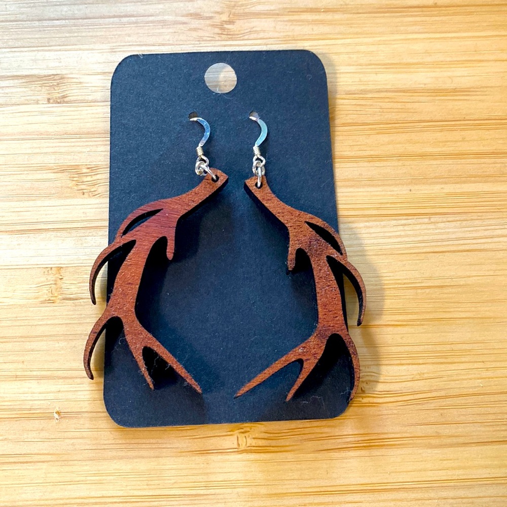 Laser cut earrings from Hawaiian koa wood